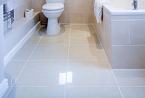 large floor tiles in small bathroom